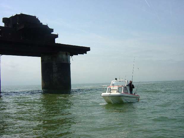 Knock John & angling boat looking south west