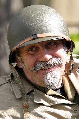 Smiling face keeps rain at bay