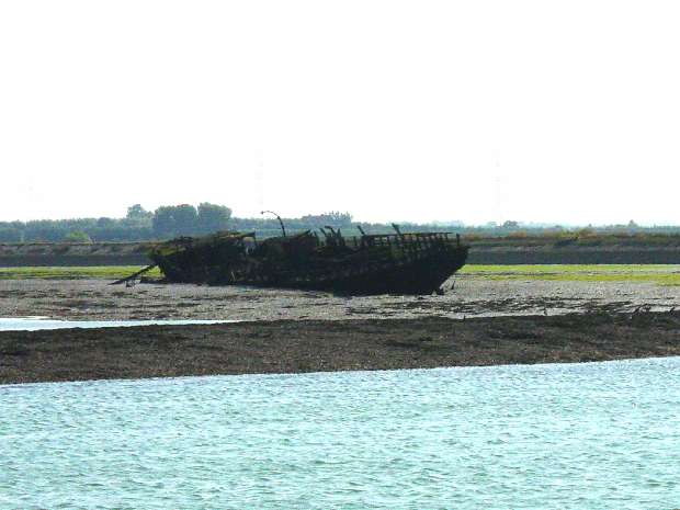Wreck of old wooden ferry in Swale