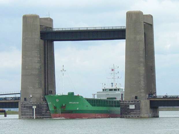 Coaster passes under behind us