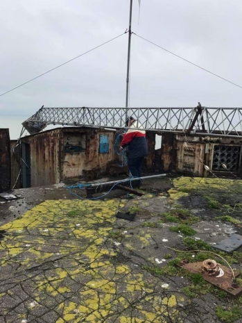 Bob Le-Roi securing collapsed Red Sands Radio Antenna Bob Le-Roi securing collapsed Red Sands Radio Antenna