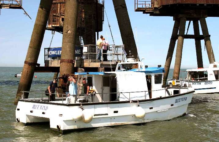 Taking kit aboard Red Sands Fort