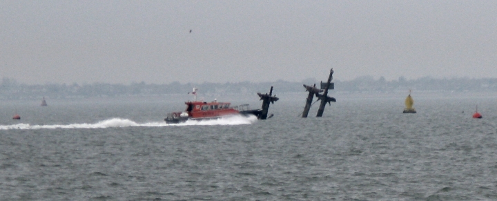 Pilot Cutter passes SS Richard Montgomery Masts