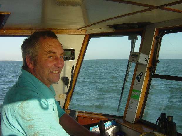 Skipper Alan Littlewort at X-Pilot helm Skipper Alan Littlewort at X-Pilot helm
