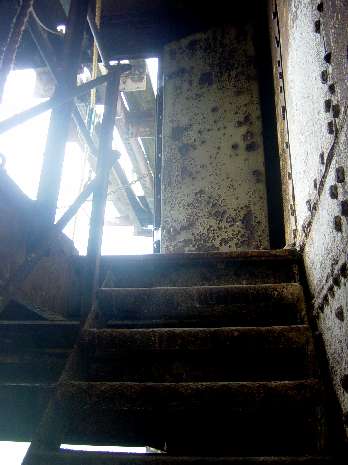 From bottom level stairs