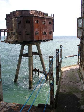 On walkway by catwalk gantry looking East