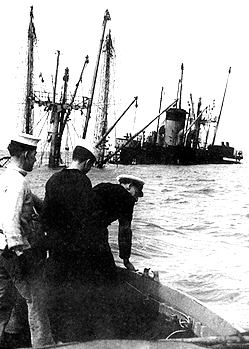 Naval personel survey wreck