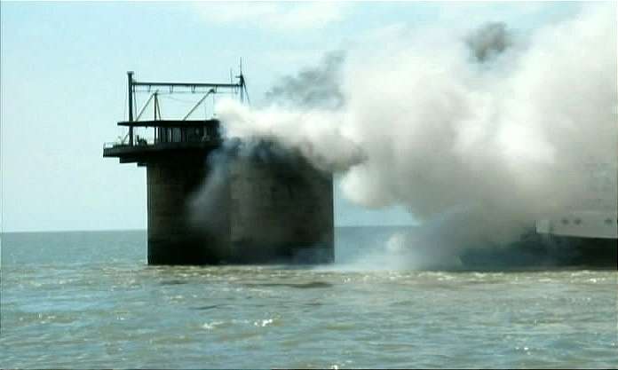 Sealand on Fire Fire Tug in mist as flames doused Sealand on Fire Fire Tug in mist as flames doused