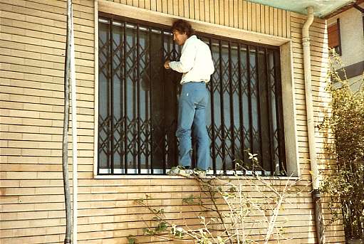 John Kenning cleans the studio window John Kenning cleans the studio window