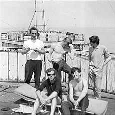 DJ's & engineers pose on gun tower G1 fort roof