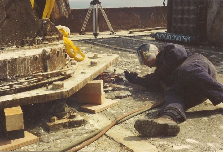 Royal Engineer acetylene cutting the 3.7" Gun fixing bolts Royal Engineer acetylene cutting the 3.7" Gun fixing bolts